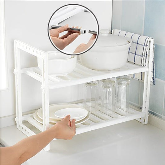 Rangement sous evier avec assiettes bols et verres